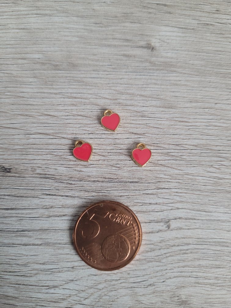 Roze/goudkleurige bedel - hart