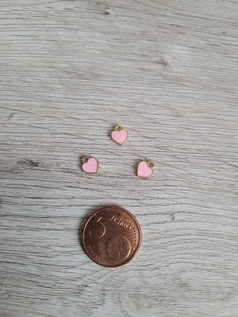 Roze/goudkleurige bedel - hart
