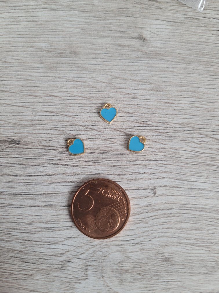 Turquoise/goudkleurige bedel - hart